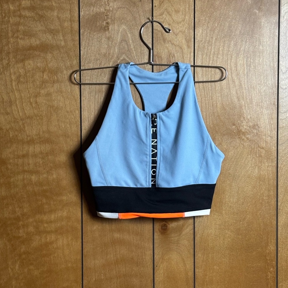 PE Nation Blue Racerback Sports Bra with Black and Orange Accents